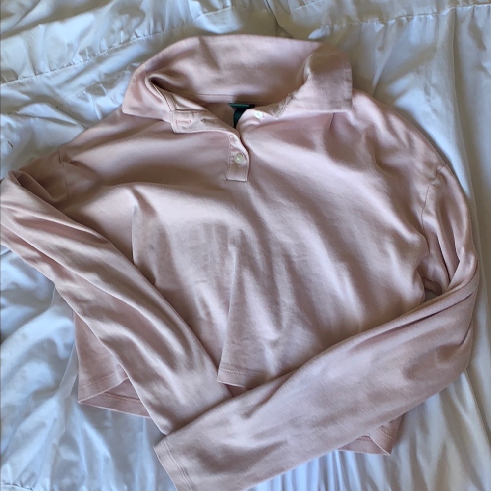 pink collared long-sleeved t-shirt
